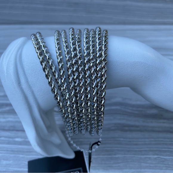 R.J. GRAZIANO Set of 10 Vintage Silvertone Twisted Bangle Bracelets Size 8.5 NWT - Picture 1 of 11